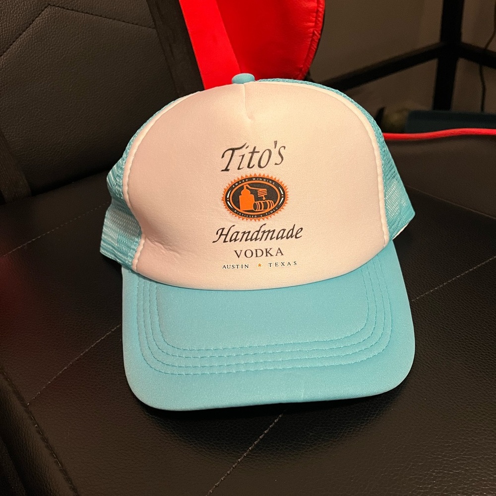 Turquoise Tito’s trucker hat